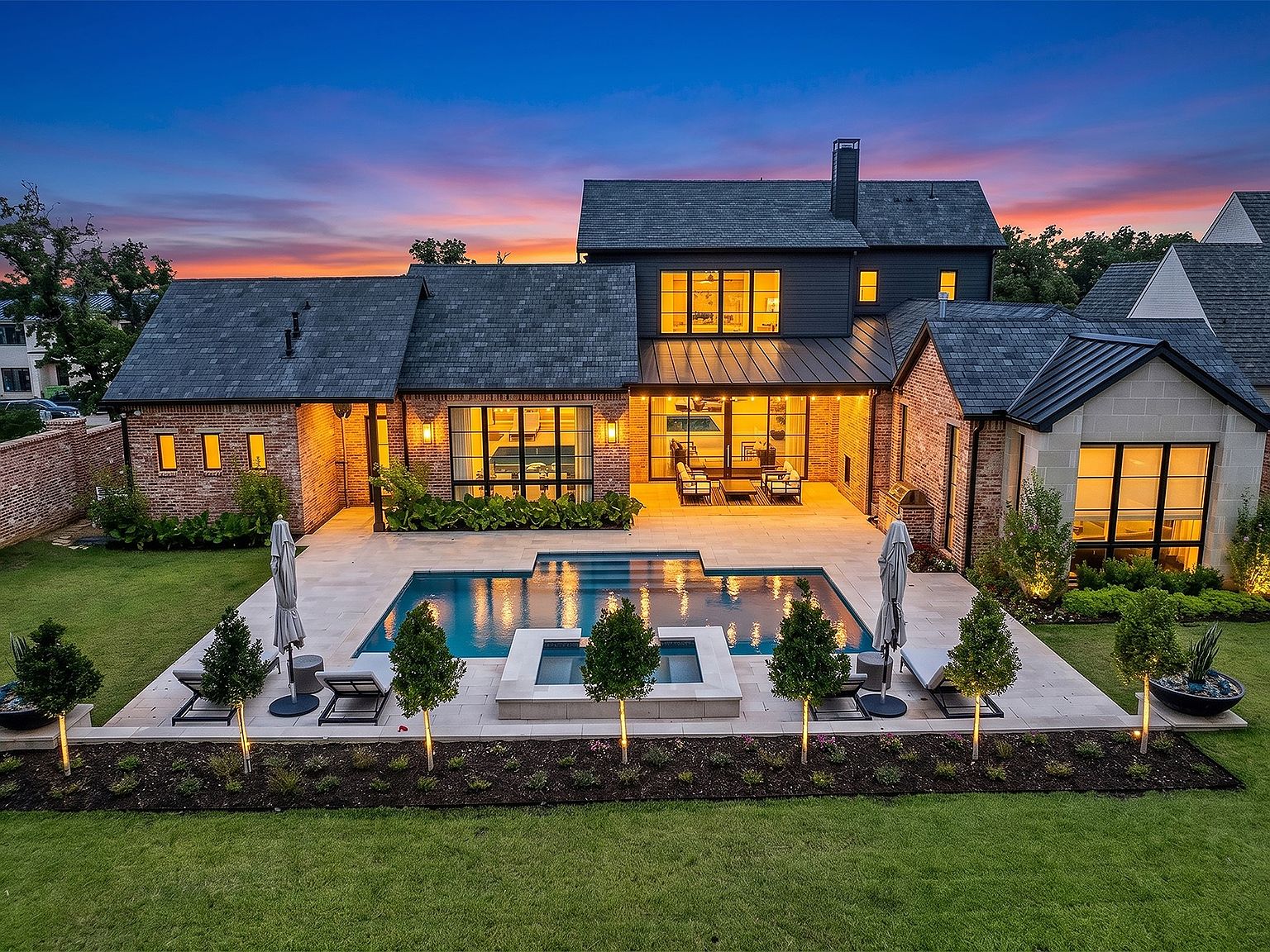Front elevation of 2500 Park Grove Loop, a 2021-built modern estate inside the gated Stoney Brook community of Southlake, Texas.